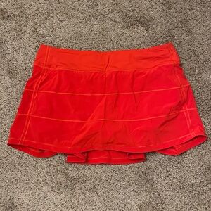 lululemon Pace Rival Mid-Rise Skirt in Hot Heat with built-in shorts!
Size 10